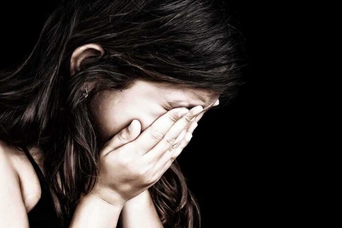shutterstock_106674485 Child covering face with hands