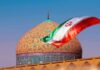 Airpower Shockwave—Iran’s Defenses Tested Iranian flag waves before an ornate mosque dome at sunset