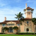 Weaponized Justice? Mar-a-Lago Raid Under Fire Mediterranean Revival mansion with tower and palm trees