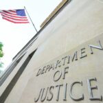 DOJ: Comey’s Post Crossed the Line Department of Justice building with American flag