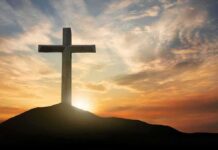 Midnight Lock-In Inside Christianity’s Holiest Site Cross on hill at sunset
