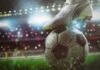 Trafficking Rings Crushed Amid Matches soccer cleat on a ball under stadium lights