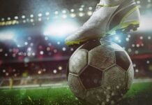 Trafficking Rings Crushed Amid Matches soccer cleat on a ball under stadium lights