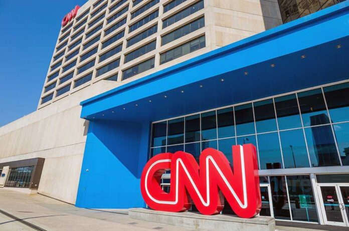 Atlanta,-,August,10:,Cnn,Center,In,Atlanta,On,August Exterior view of the CNN headquarters with a large red logo and blue entrance