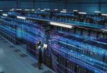 Unexpected Revolt Freezes AI Megaprojects Technician with laptop in a large data center aisle