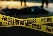 “Say Goodbye” Clip Stuns Investigators yellow police tape at a nighttime crime scene
