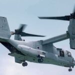tiltrotor aircraft flying with landing gear down