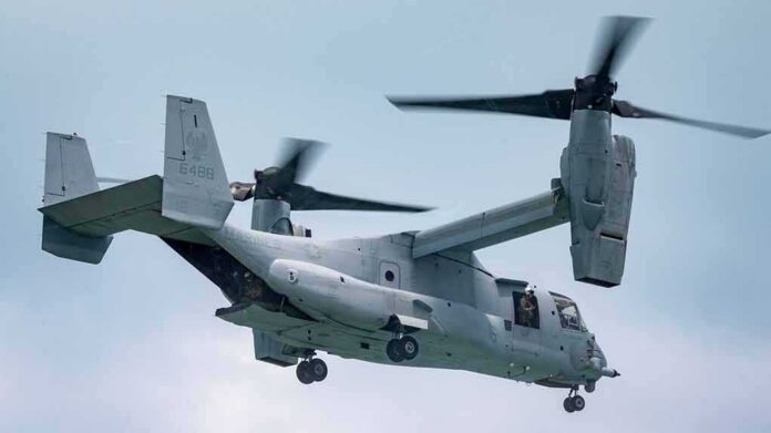 shutterstock_2325986081 tiltrotor aircraft flying with landing gear down