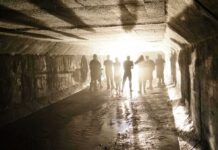 City Fumbles, Venice Hires Ex-Gang Muscle Silhouetted people standing in a concrete tunnel