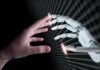 Palantir’s Counterstrike: Take Back Control Human hand reaching toward a robotic hand