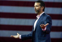Borrowed Bets, Trump Jr. – What Could Go Wrong? Donald Trump Jr. speaking on stage with arms outstretched