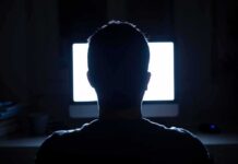 Pentagon Videos Finally Surface – Archives Hold Hours person silhouetted in front of a bright computer screen