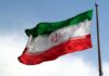 Kharg Island: One Chokepoint Could Cripple Iran Iranian flag waving on a pole