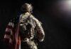 Inside Iran: Daring U.S. Extraction Soldier in tactical gear with American flag over shoulder