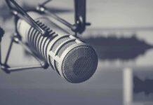 Trusted Voices Close Ranks – Radio Star’s Final Sign-Off Studio microphone on shock mount close-up