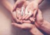 School Transition Alleged – Family Cut Off Hands holding a paper cutout family