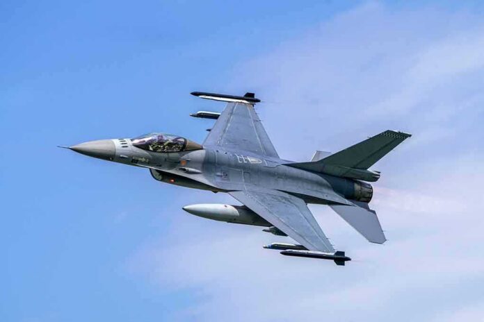 shutterstock_1629356173-1 Fighter jet banking in the sky