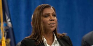 woman speaking at a press conference
