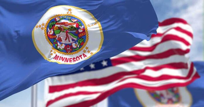 shutterstock_2165286029 Minnesota state flag waving in the wind