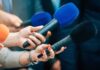 Rocket Megaplex Roars Into Vermilion – Jobs Tsunami Coming Reporters holding colorful microphones