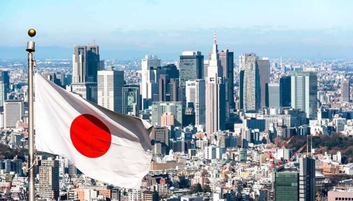 Japanese flag waving with modern city skyline in background