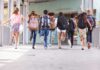 DOJ Crackdown Halts Kids’ Gender Drugs group of schoolchildren running with backpacks