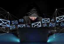 D.C. Bomb Email Triggers Rapid Federal Dragnet Hooded person using a laptop surrounded by email icons