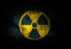 radiation hazard symbol on dark textured background