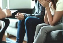 Couple sitting on couch during counseling session