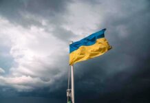 Who Hit Starshield? Trump Says Not Me Ukrainian flag waving against a stormy sky