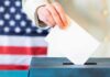 DSA Endorsements Ignite ‘Communist’ Firestorm Hand placing ballot into a box