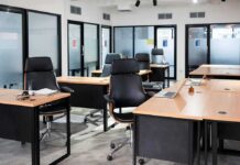 Homelessness Council: Government Ghost Office Exposed Modern open office with empty desks and black chairs