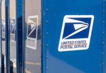 Stolen Ballots? Mailroom Heist Exposes Voting Weak Spot USPS mail collection boxes lined up outdoors
