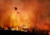 Held Hostage: Rebuild Funds Stuck In Escrow Helicopter fights massive wildfire over burning forest
