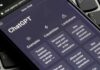 Smartphone showing ChatGPT interface on a keyboard