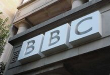 BBC Showdown: Deposition Deadline Traps Trump BBC logo on a building facade
